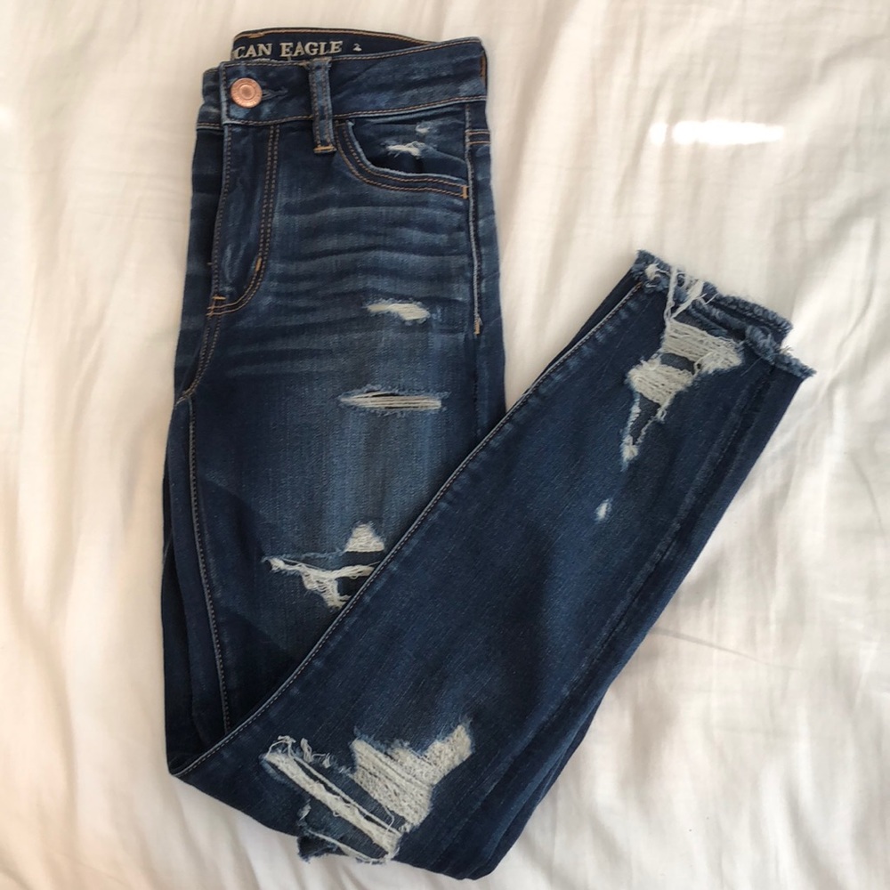 High waisted distressed jeans